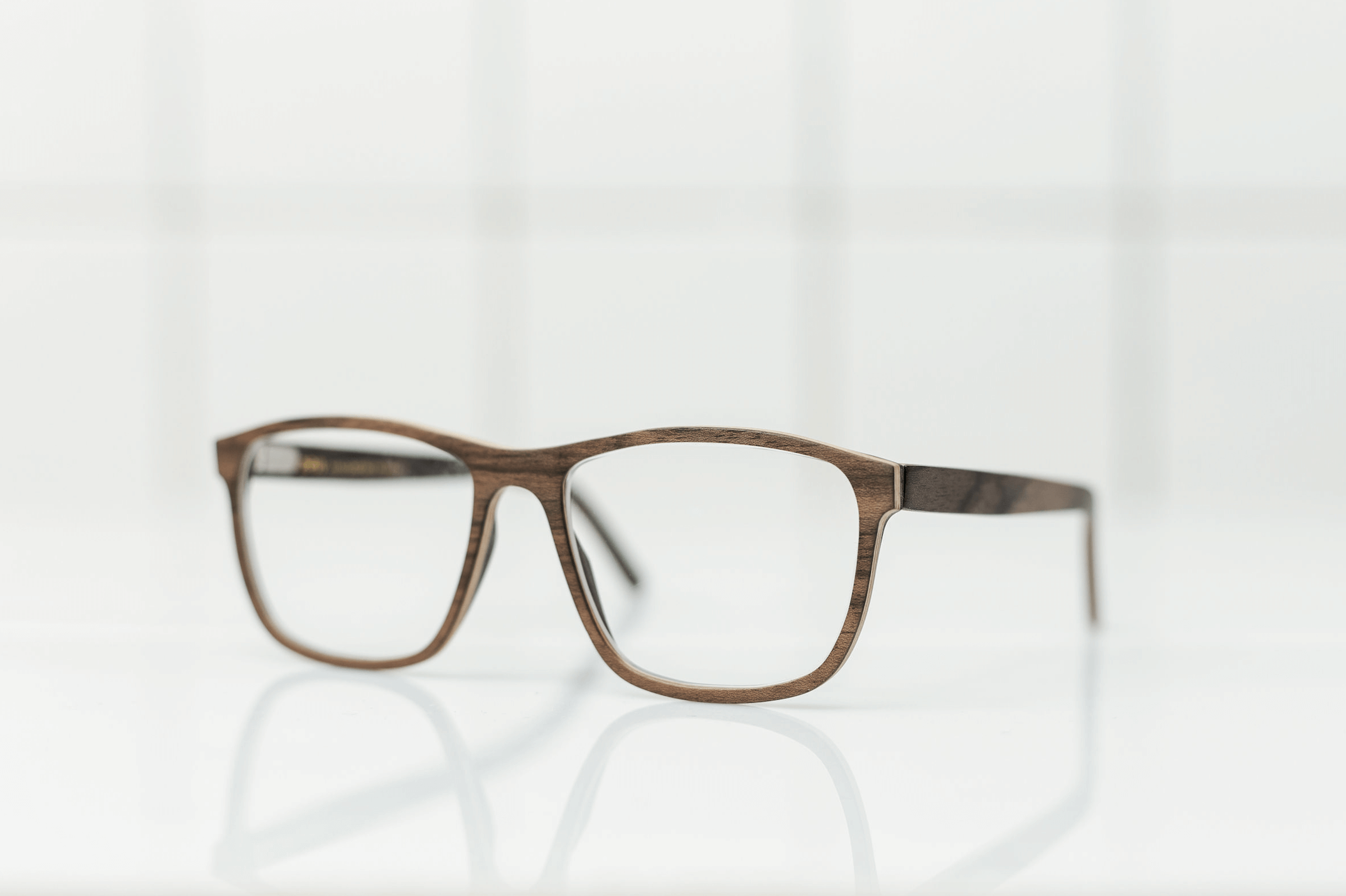 collection of wooden spectacle frames